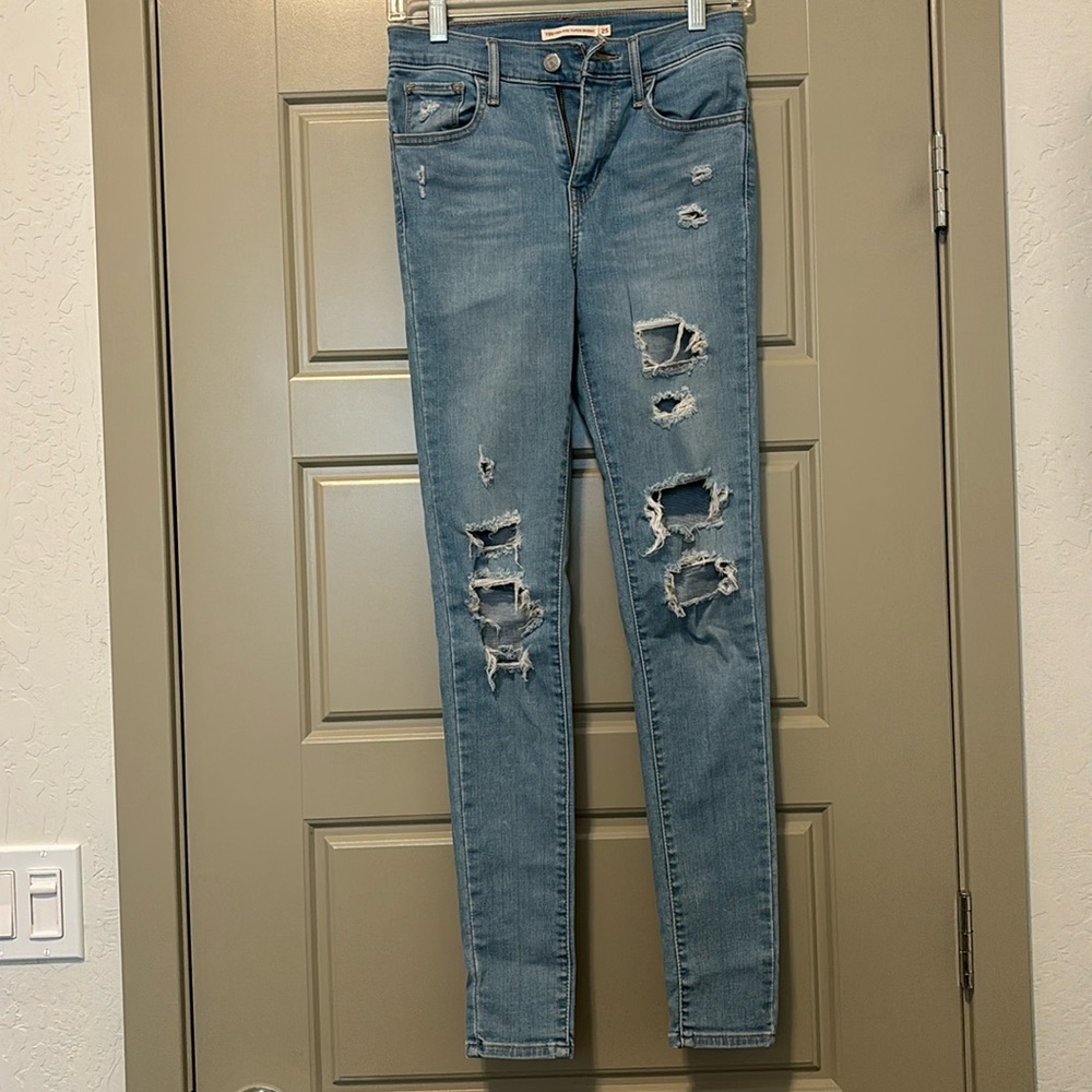Women’s high-rise super skinny ripped jeans, size 25
